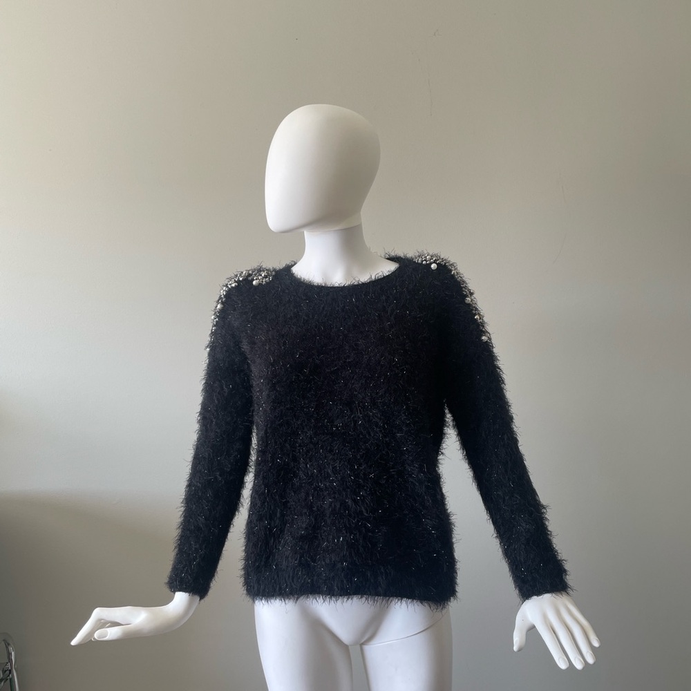 Elegant Black Sweater with Embellished Shoulders